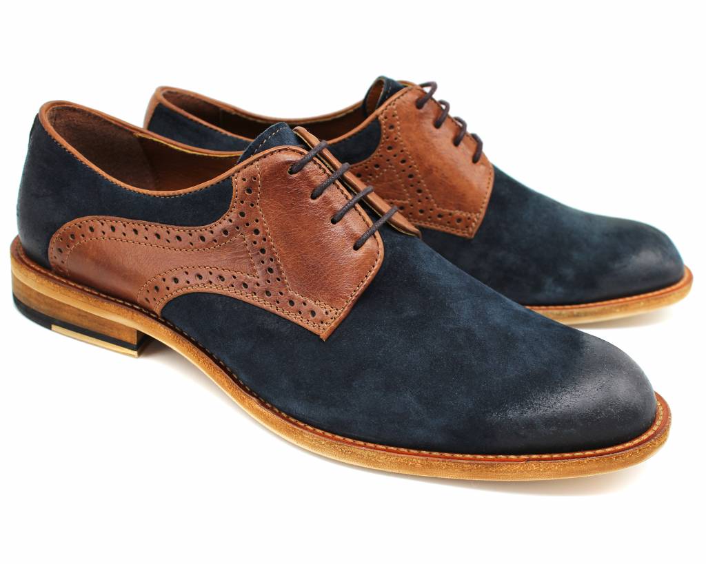 Pair of navy suede and brown leather derby shoes, front three-quarter view