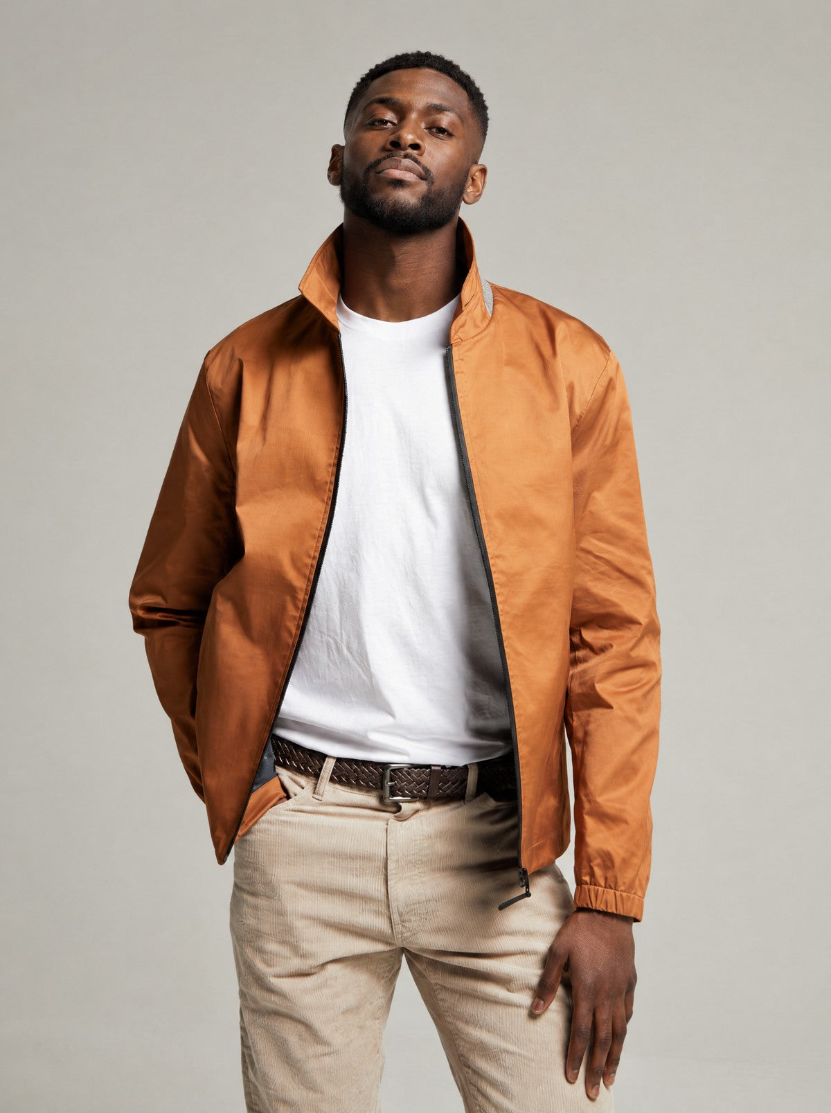 Martelloz zip coach jacket in Tan, worn open over a white T-shirt