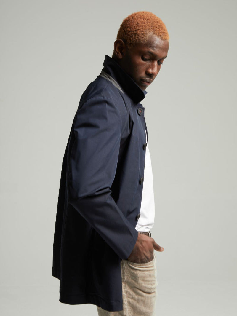 Side view of the Navy Wentworth raincoat with the collar turned up