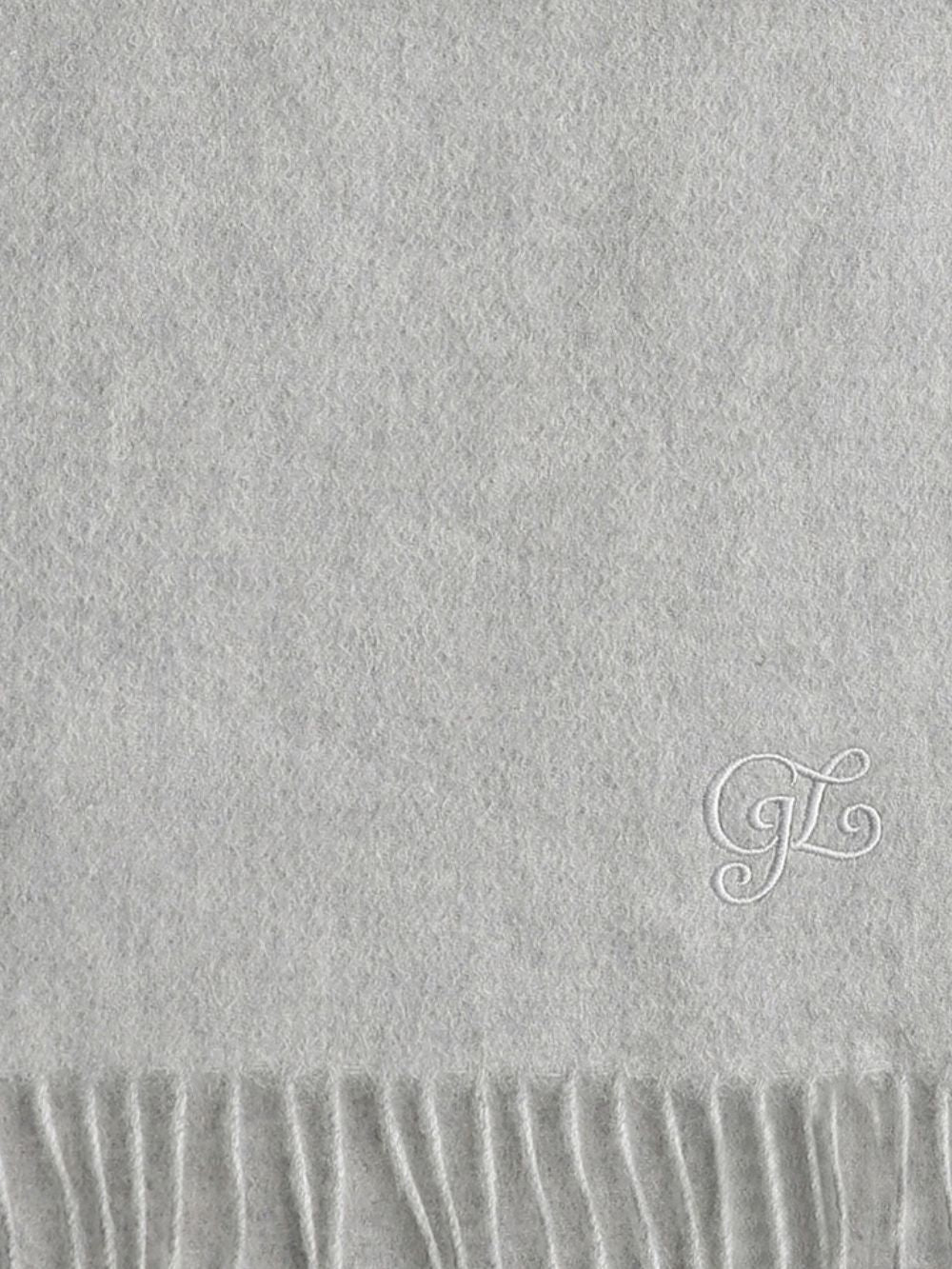 Detail of the tonal embroidery near the corner of the Grey scarf