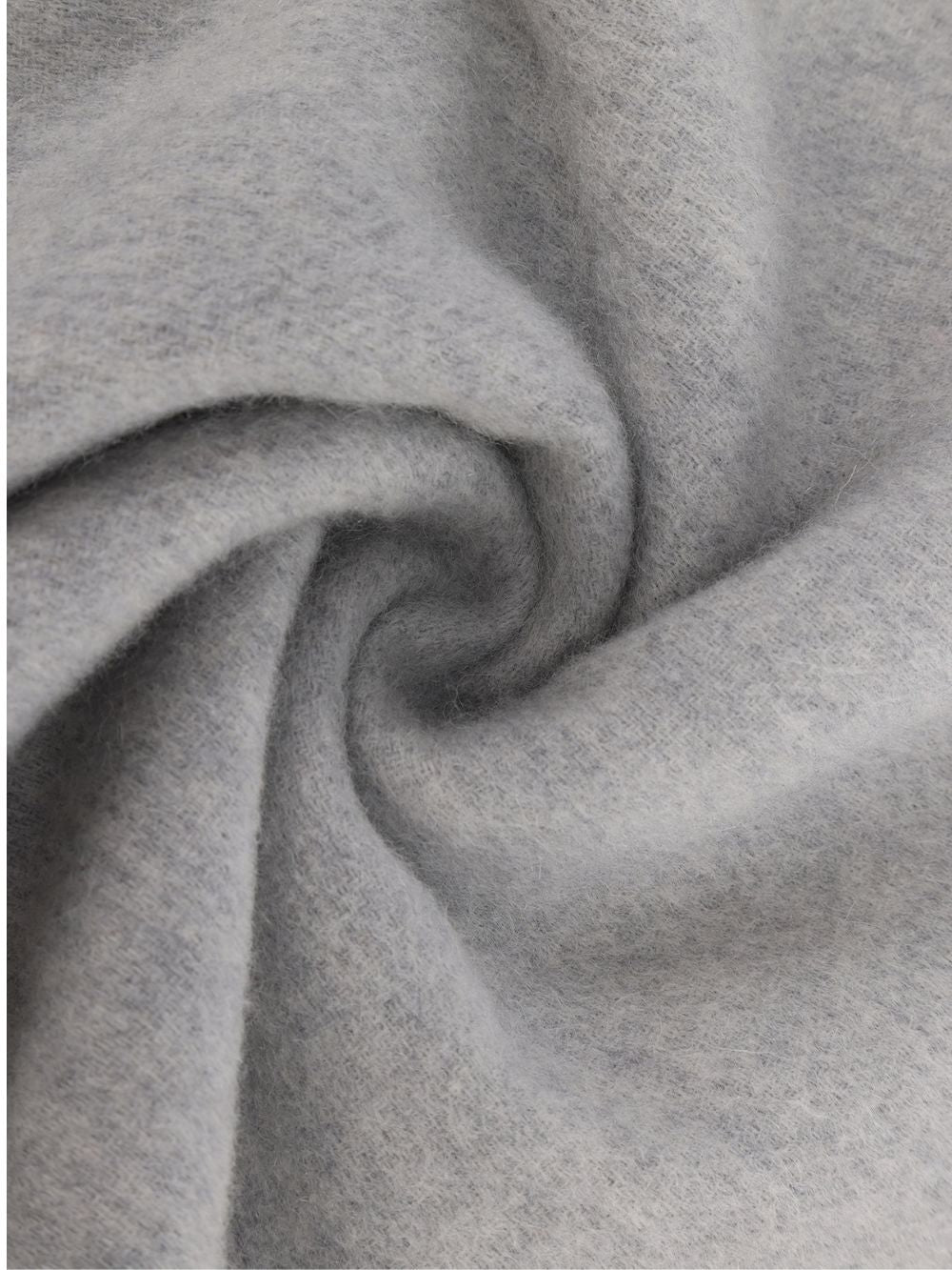 Grey cashmere wool scarf twisted to show the soft brushed texture