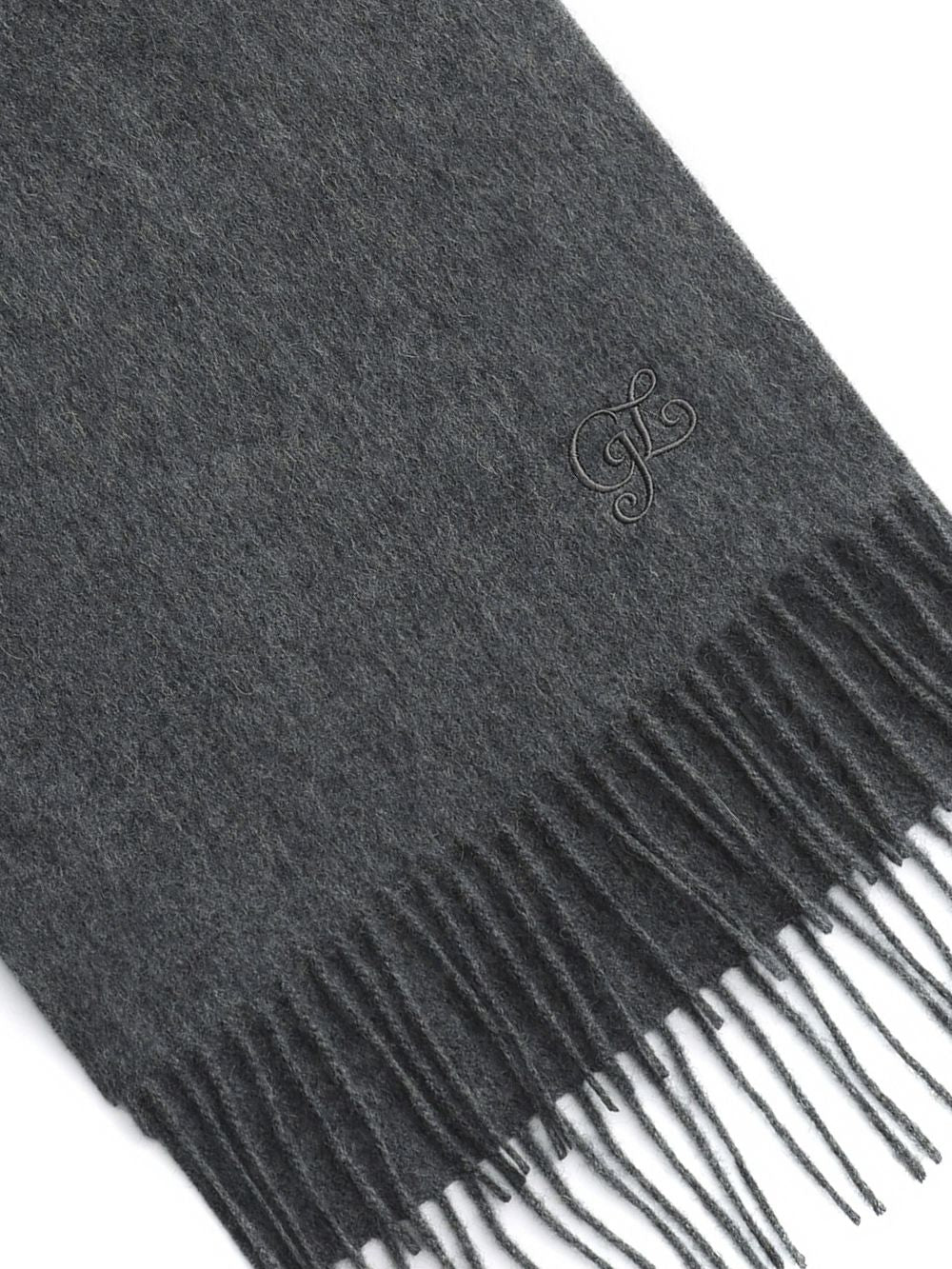Close-up of the fringe and embroidery on the Charcoal cashmere wool scarf