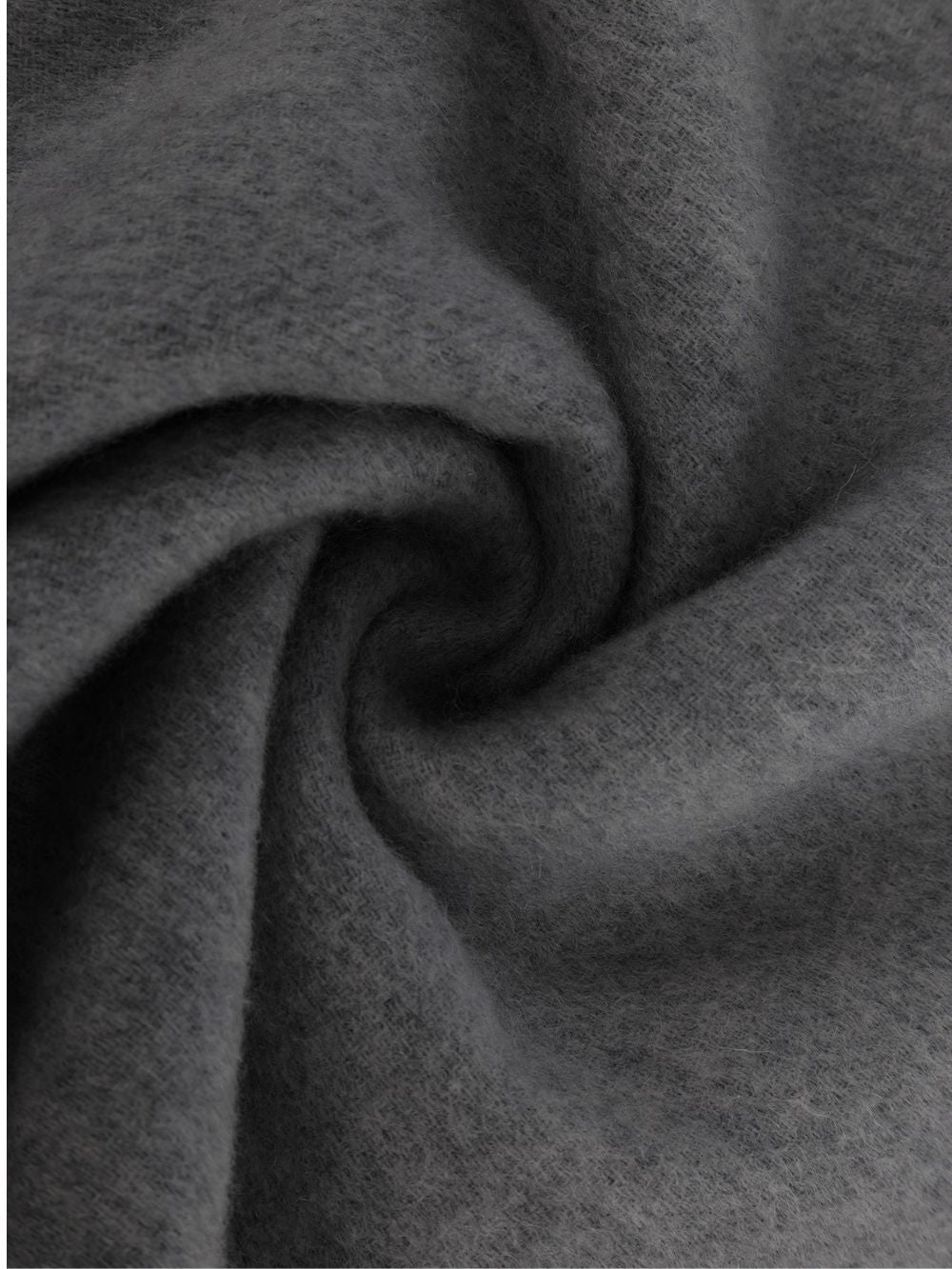 Charcoal cashmere wool scarf twisted to show the soft texture