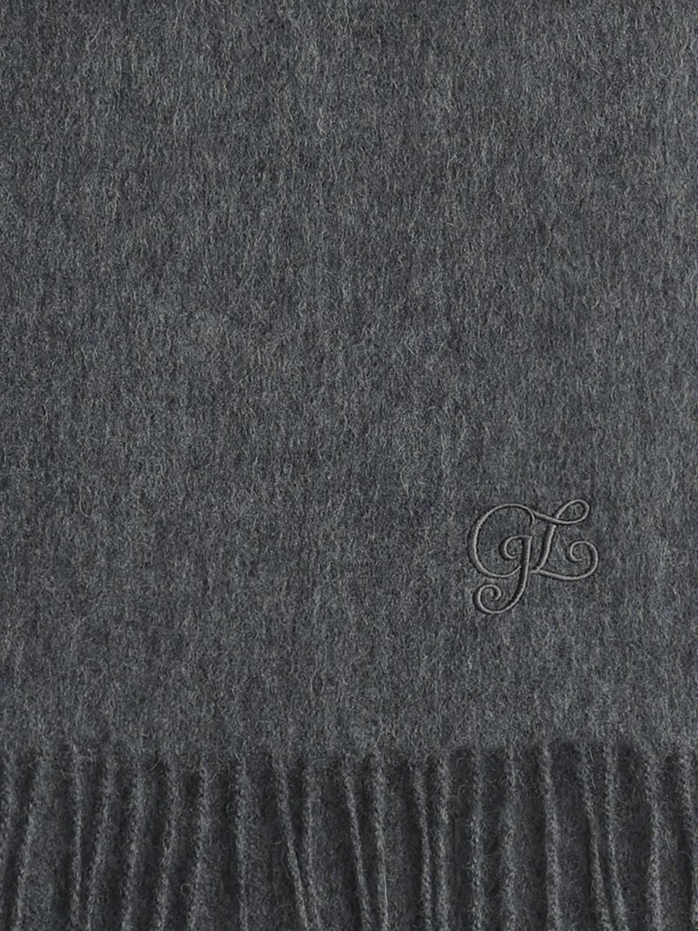Detail of the tonal corner embroidery on the Charcoal scarf