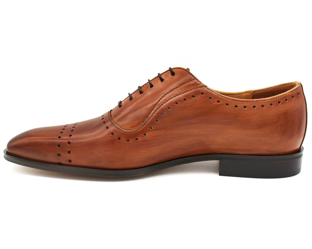 Brown oxford shoe, inside profile showing the punched toe line and dark heel