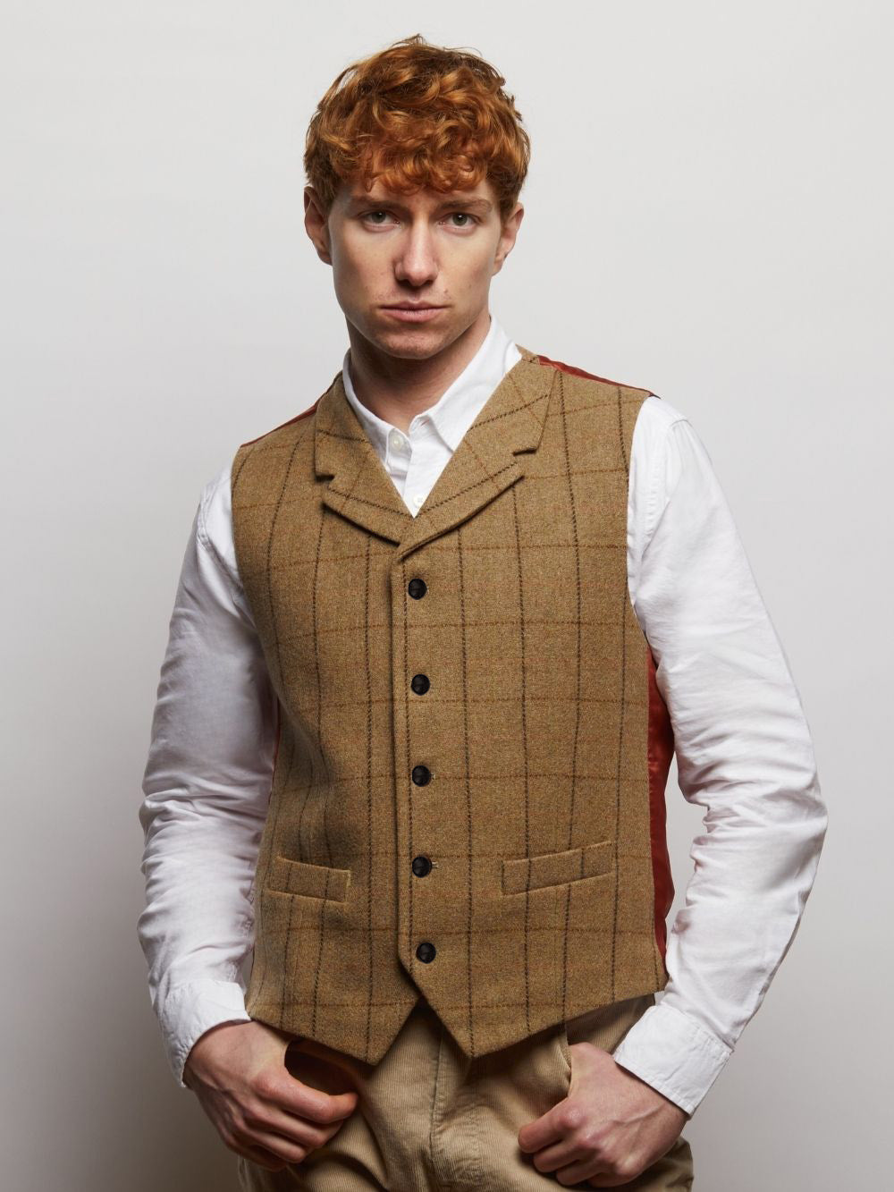 Guards London Sherwood tweed waistcoat in Tan Windowpane, worn over a white shirt