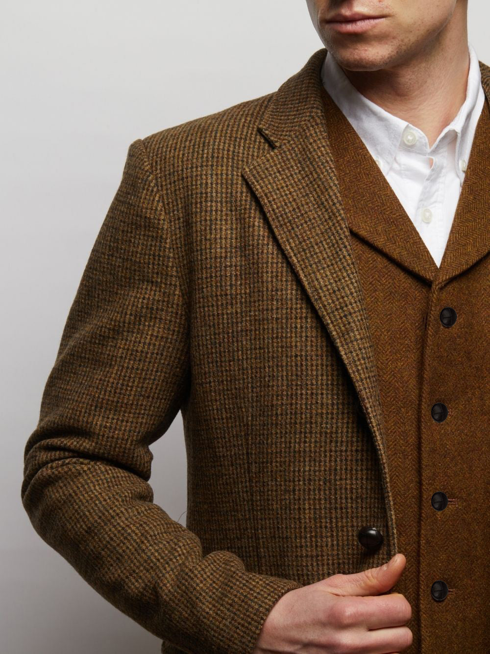 Close-up of the Brown Herringbone Sherwood waistcoat with tweed jacket