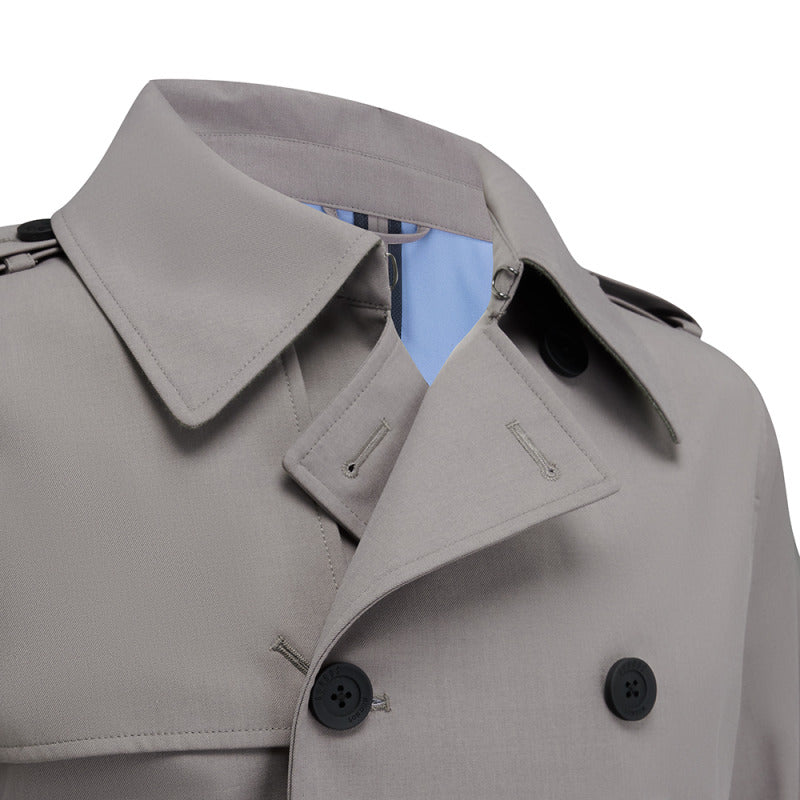Close-up of the collar and double-breasted buttons on the Beacon trench coat in Putty