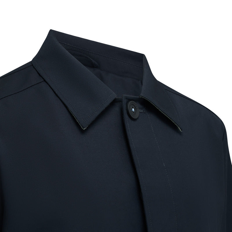 Close-up of the collar and top button on the Carver raincoat in Navy