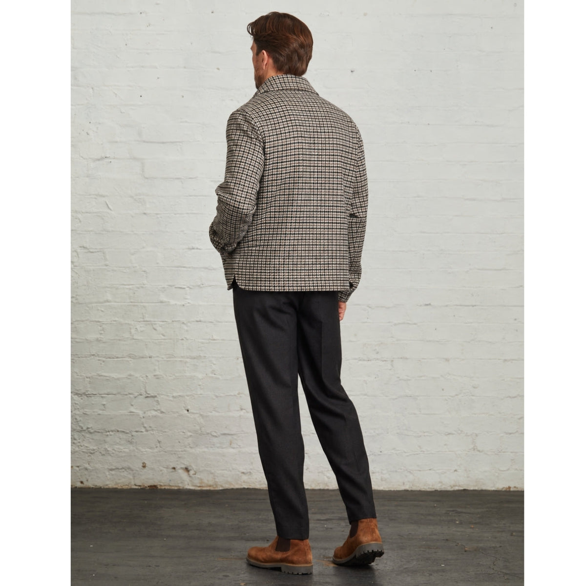 Back view of the Edward Harrington jacket in Grey on a model