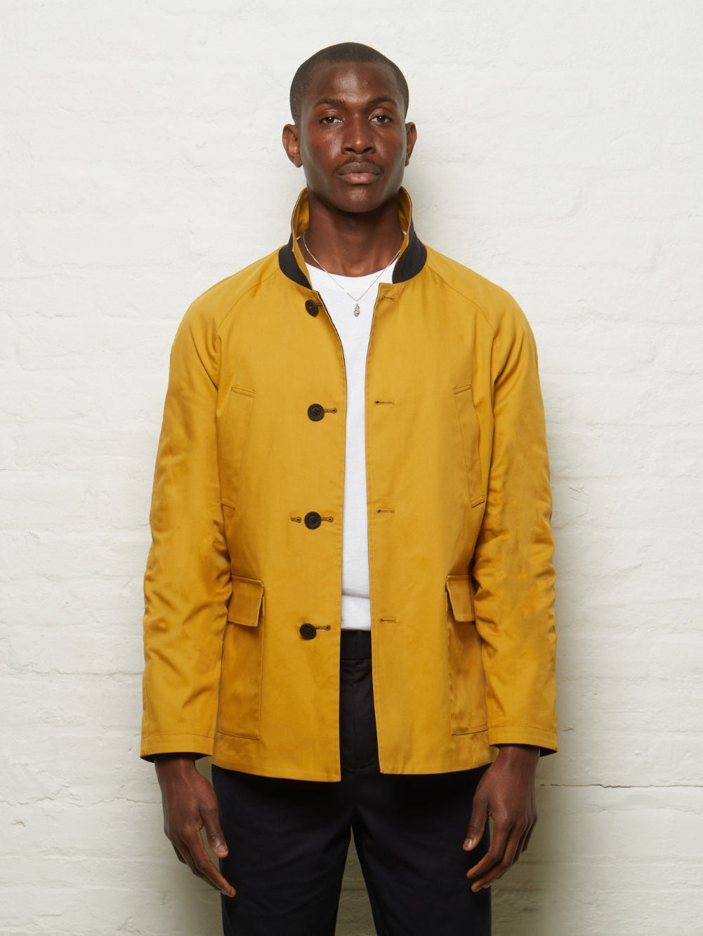 Fusilier Reversible Jacket in Gold/Navy, gold side out, worn buttoned, front view