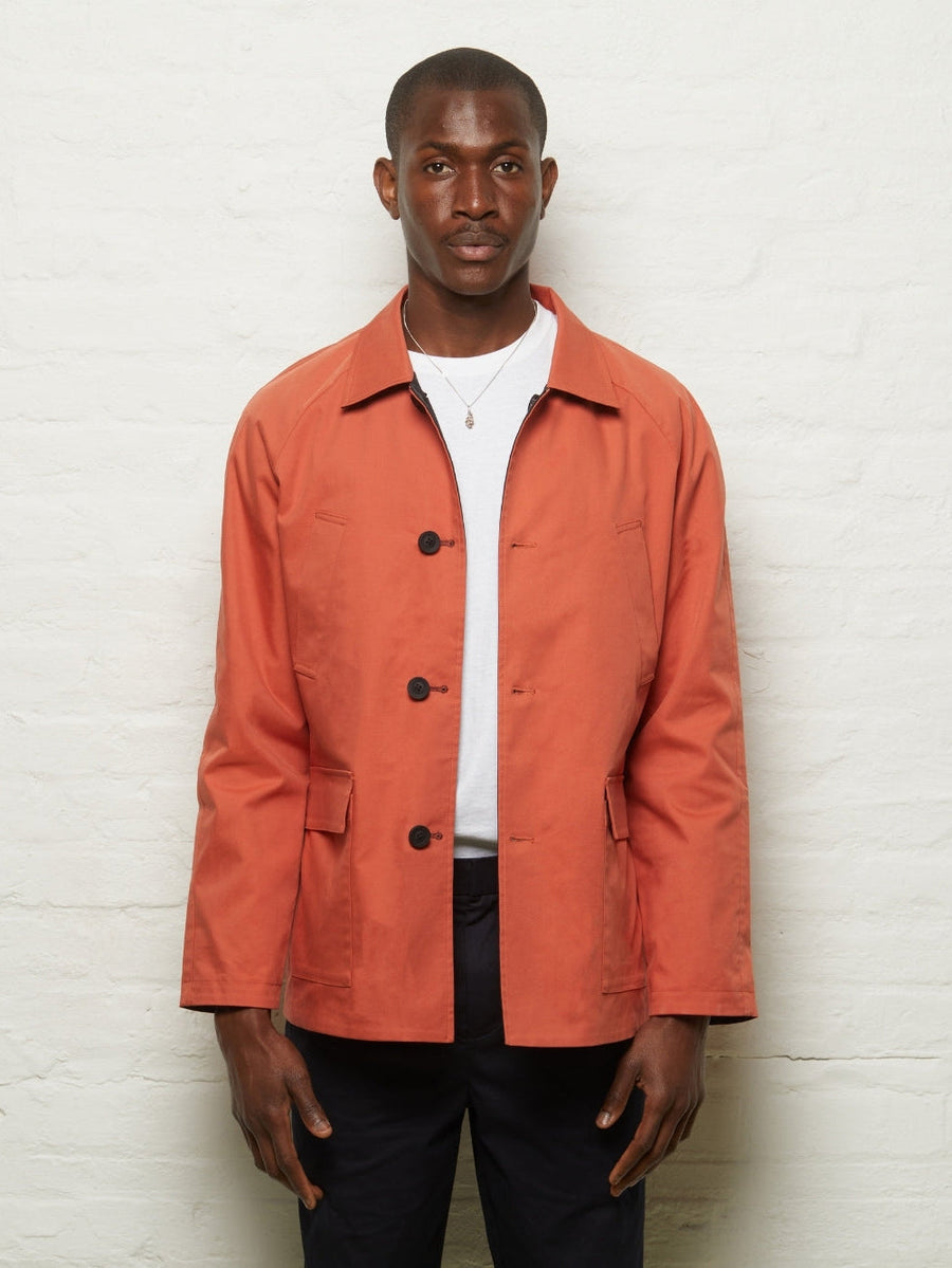 Guards London Fusilier Reversible Jacket in Orange/Black, orange side out, worn buttoned, front view