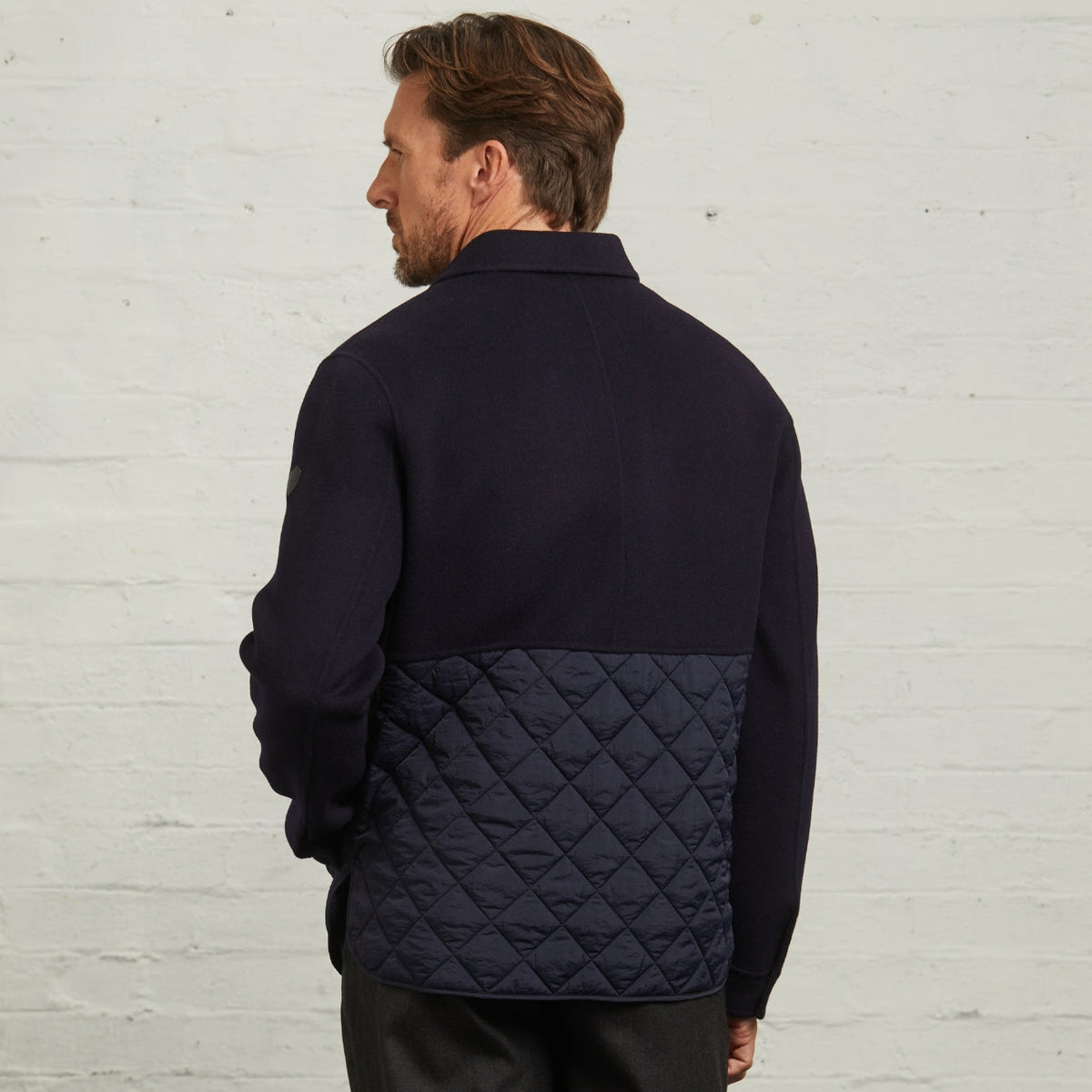 Horace Quilted Overshirt in Navy, back view with wool yoke and quilted lower panel