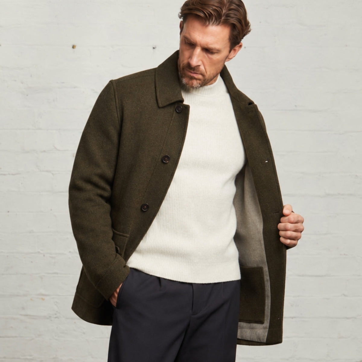 Kyle Wool Tweed Carcoat in Green, held open to show the brushed lining