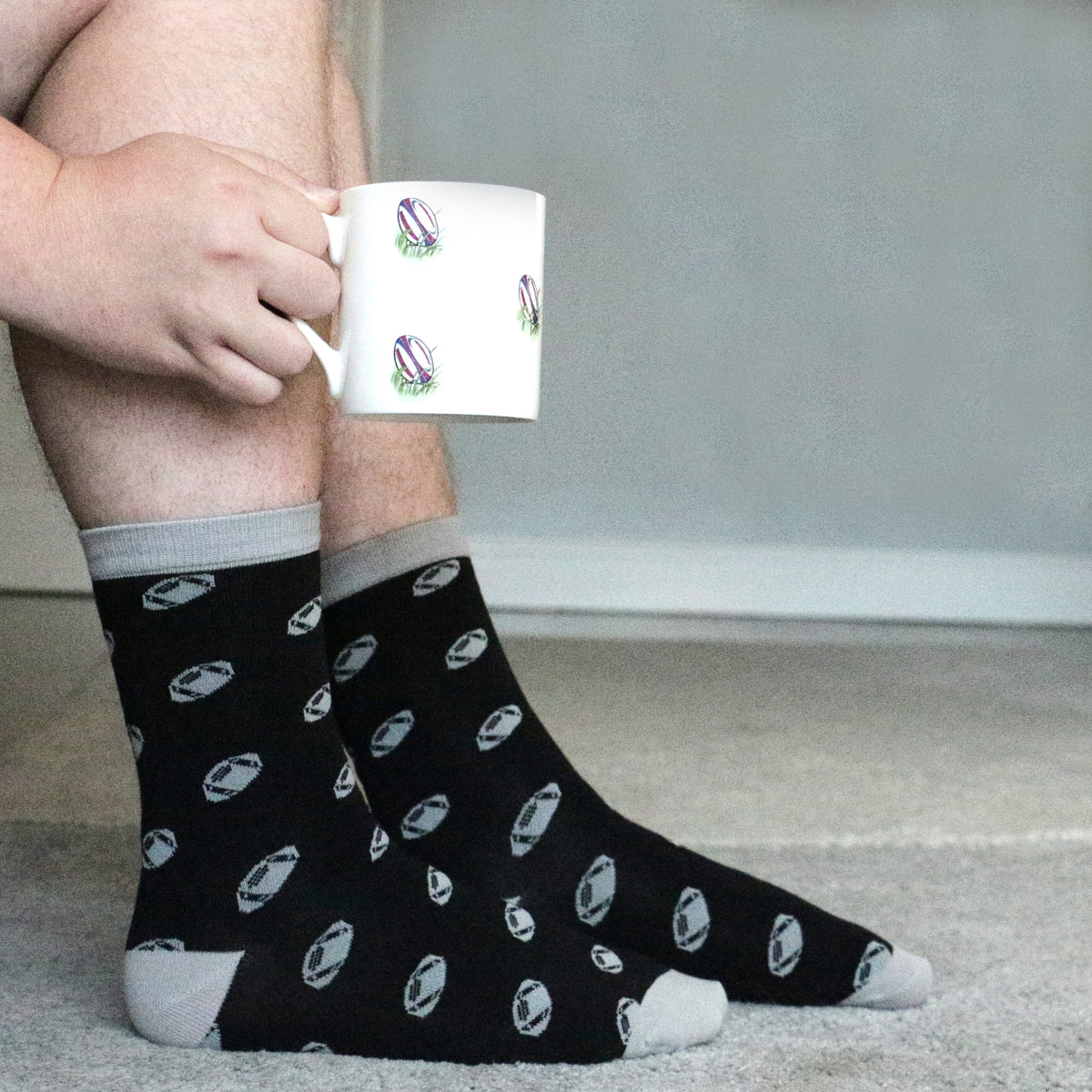 Rugby Ball Bone China Mug and Socks Gift Set - Leonard Silver - socks worn with mug in hand