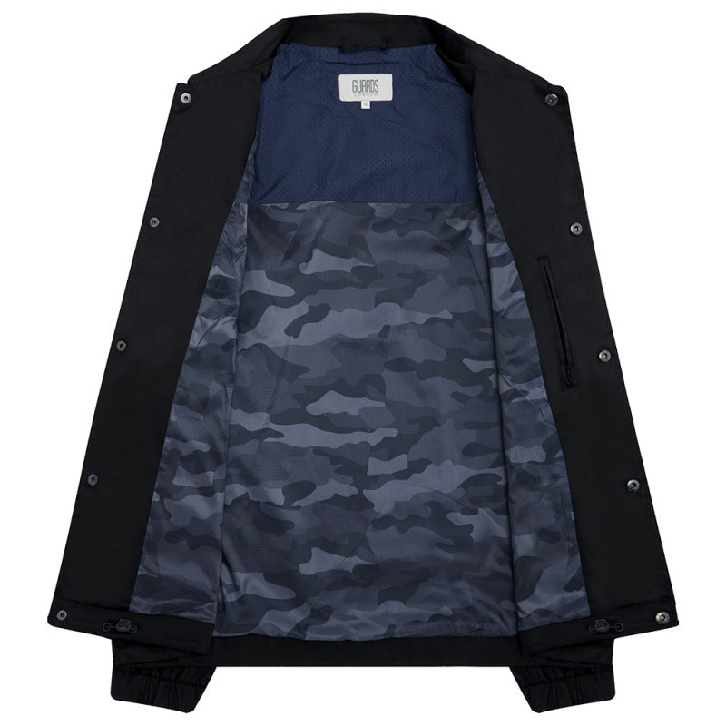Martello II Black jacket laid open to show the camouflage-print lining
