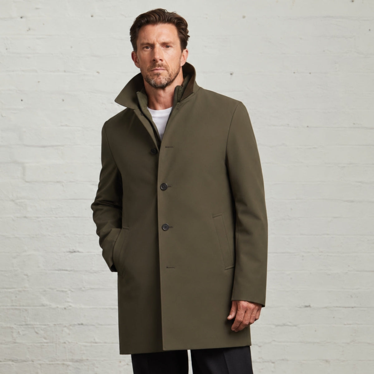 Monti raincoat in Khaki worn buttoned, three-quarter view