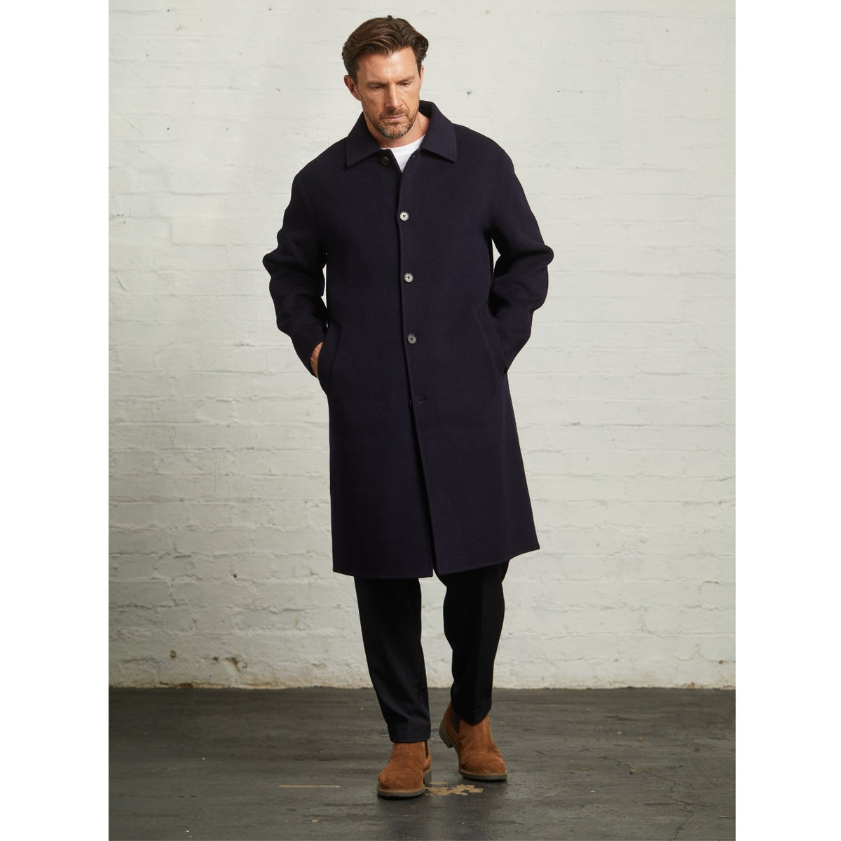 Oscar blind-seam overcoat in Navy, full-length view on a model