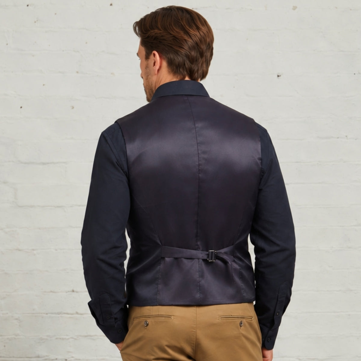 Back view of the Robert waistcoat showing the lined back and adjuster strap