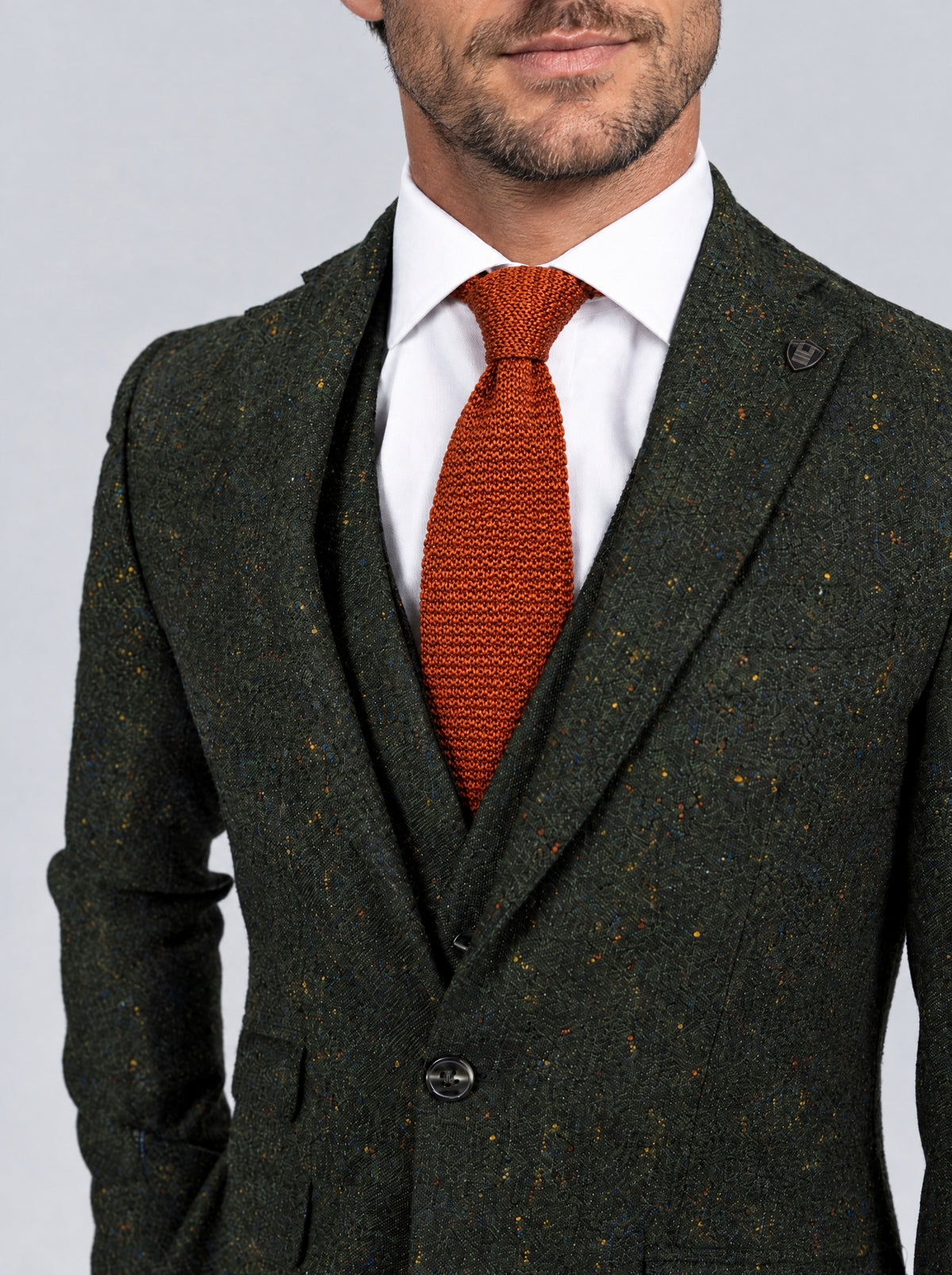 Green Multi Fleck Tweed Suit – lapel, waistcoat and cloth detail with bronze knitted tie