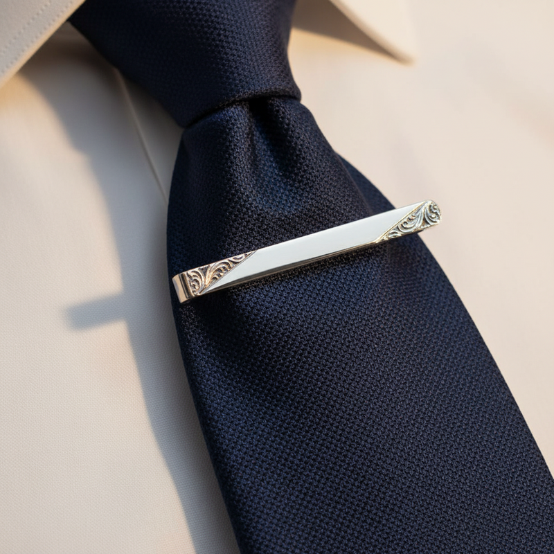 Engraved Ends Hallmark Sterling Silver Tie Slide - Leonard Silver - worn on a navy tie