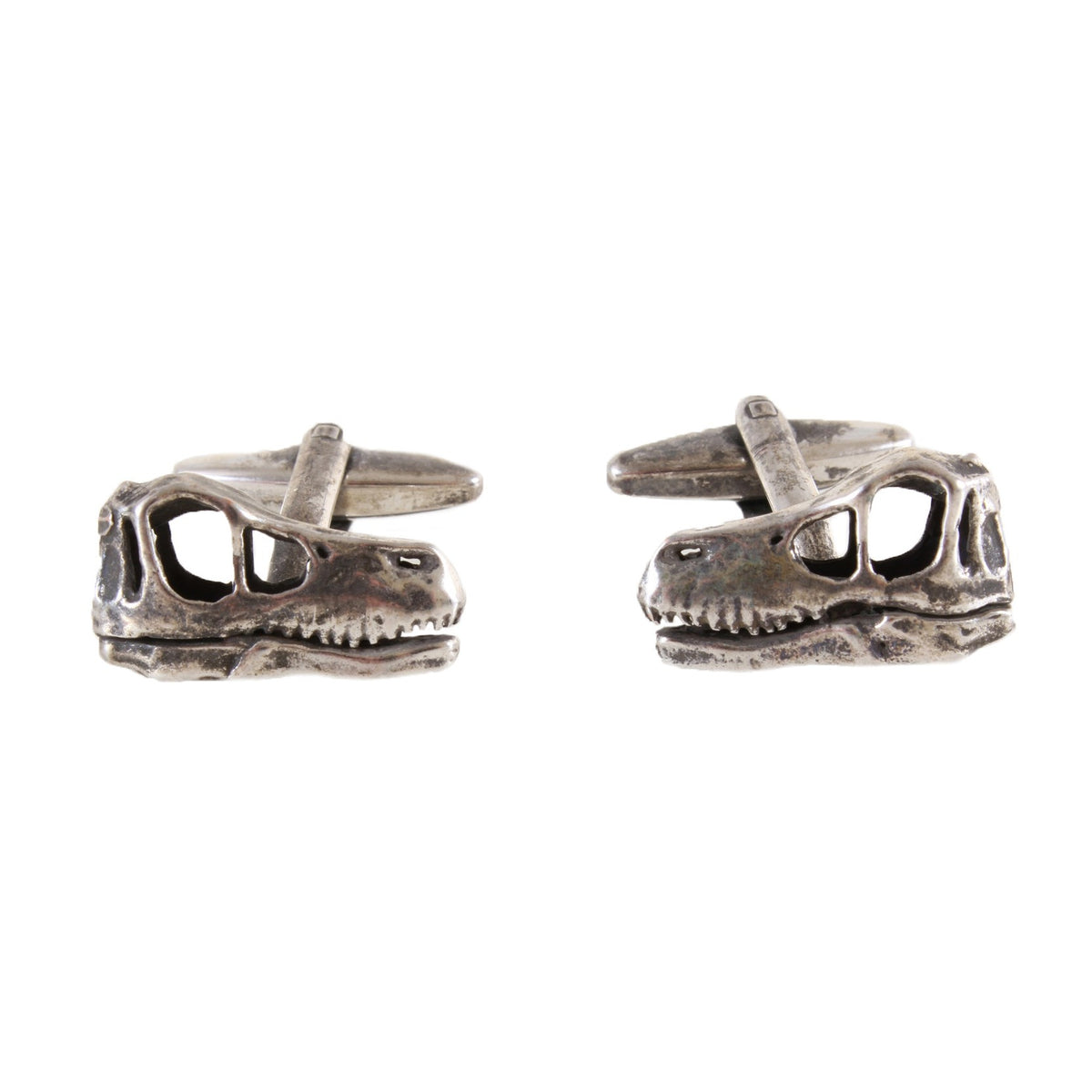 Burnished Rhodium Dinosaur Skull Cut-Out Cufflinks - Leonard Silver - pair shown side on with bar fittings